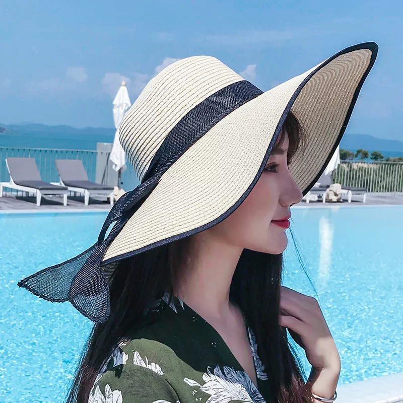 ภาพหน้าปกสินค้าหมวกชายหาด ฟีลธรรมชาติ หมวกสานปีกกว้าง ชายหาด สไตล์เกาหลี รุ่นนิยม (พร้อมส่งในไทย) จากร้าน chenqiaojia บน Shopee