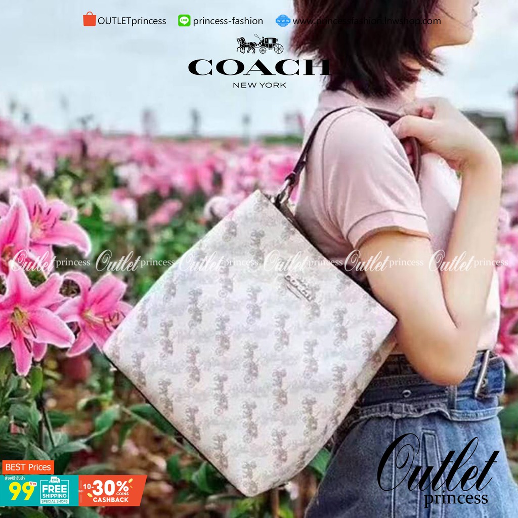 Coach town bucket bag with horse and carriage print hotsell
