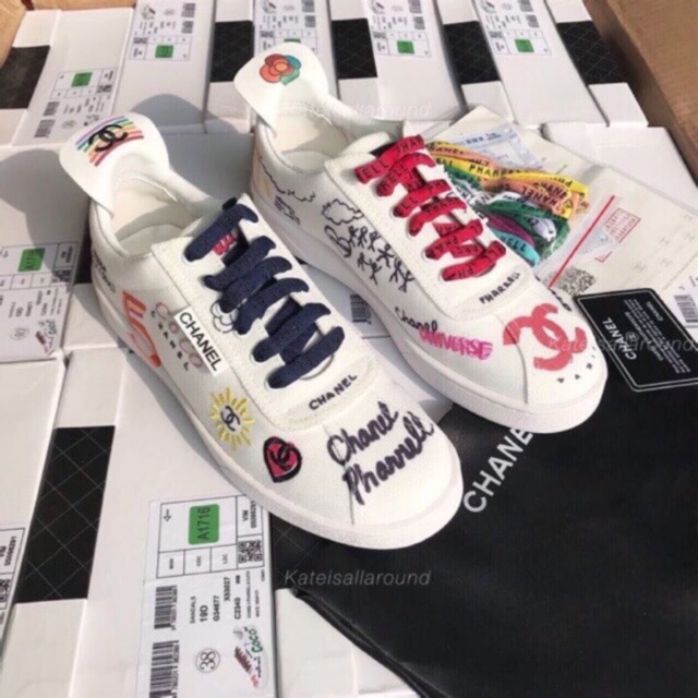 A PAIR OF WHITE & MULTICOLOUR GRAFFITI COCO SNEAKERS, CHANEL x