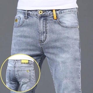 ♙✣Summer high-end jeans men s fashion brand Slim feet Korean version of the trend of 2021 new กางเกงขายาวบางสบายๆ