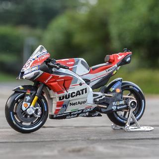ภาพหน้าปกสินค้าMaisto 1:18 2018 Ducati MotoGP Racing #04 รถหล่อแบบคงที่โมเดลรถจักรยานยนต์ของเล่นงานอดิเรกของสะสม ซึ่งคุณอาจชอบสินค้านี้