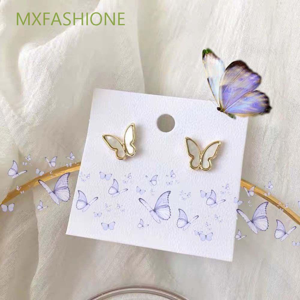 ภาพหน้าปกสินค้าMXFASHIONE White Earrings Women Butterfly Wing Stud Earrings Mini 925 Silver Needle Hypoallergenic Delicate Girls Shell Pearl/Multicolor