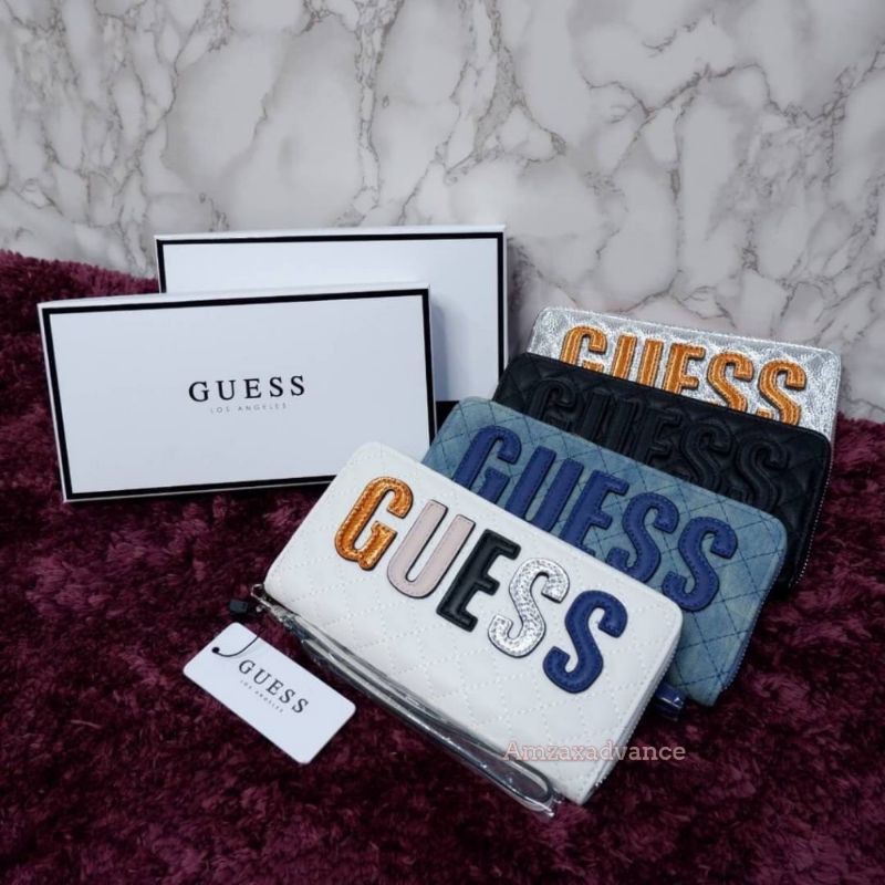 กระเป๋าสตางค์ใบยาว-guess-สวยคุ้มมี3ช่องใหญ่และ1ช่องเสียบบัตรงานแท้สวยคุ้ม