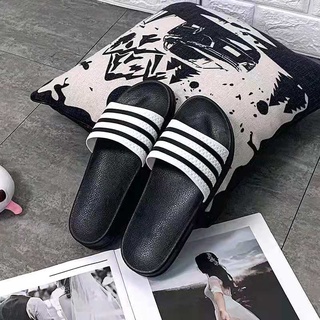 ภาพขนาดย่อของภาพหน้าปกสินค้ารองเท้าแตะผู้หญิง/ชายใส่ได้ (ลายเส้น) รองเท้าแตะยางพื้นนุ่มใส่สบาย ไซส์36-45 จากร้าน fashion_shop9 บน Shopee ภาพที่ 1