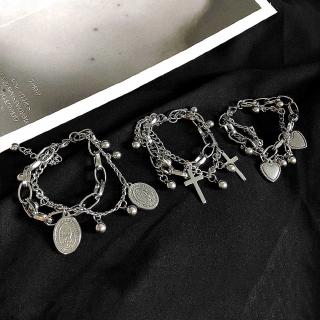 ภาพหน้าปกสินค้า12041 New ins cold wind dark double Jesus bracelet cross love design level accessories ซึ่งคุณอาจชอบราคาและรีวิวของสินค้านี้