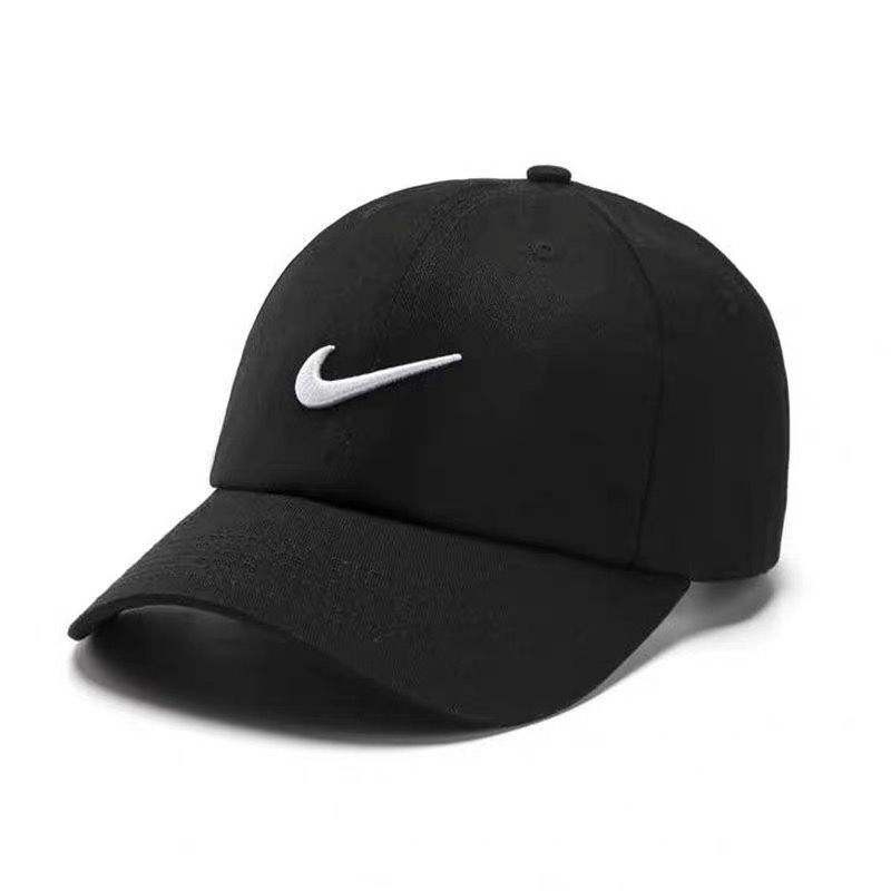 ภาพหน้าปกสินค้าไนกี้ หมวกแฟชั่น หมวกผ้าฝ้าย สีทึบหมวกเบสบอลหมวกกลางแจ้งหมวกบังแดด Nike Unisex Hat จากร้าน bagbag08 บน Shopee