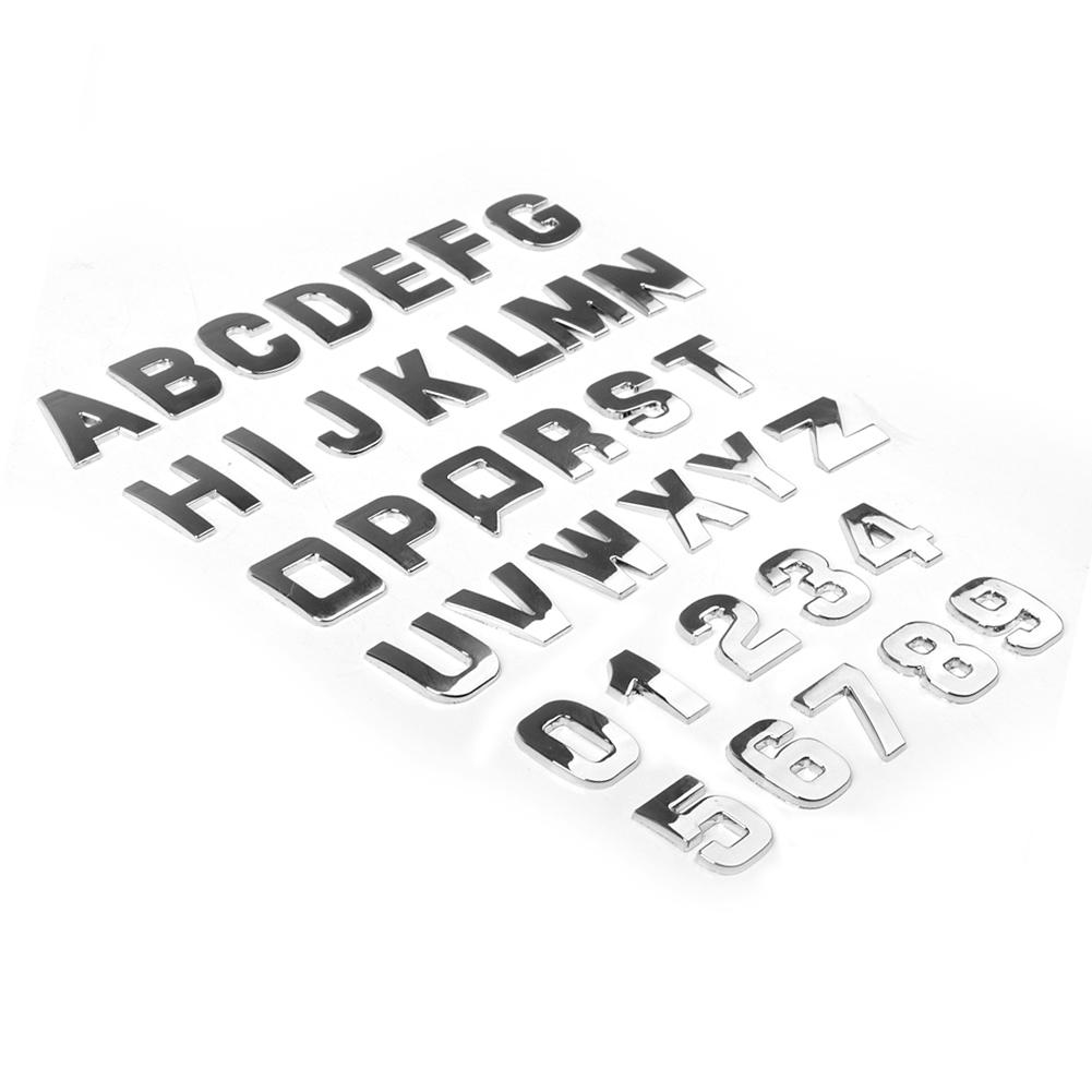 ภาพหน้าปกสินค้าBG DIY 3D โลหะตัวอักษรสติกเกอร์สัญลักษณ์รถตัวอักษรป้ายเงินรูปลอก (A-Z & 0-9)