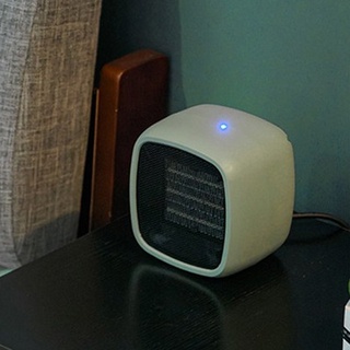 ภาพหน้าปกสินค้าelectric heater เครื่องทำความร้อนไฟฟ้าไฟฟ้าขนาดเล็กเครื่องทำความร้อนในครัวเรือนมืออุ่นสำนักงาน ที่เกี่ยวข้อง