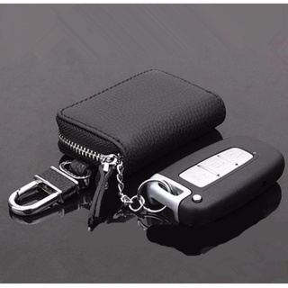ภาพหน้าปกสินค้ากระเป๋าใส่พวงกุญแจรถยนต์หนังแท้แบบมีซิป (สีดำ)-สากล ที่เกี่ยวข้อง