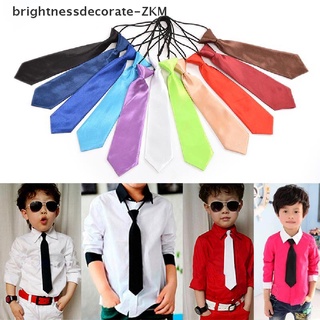 ภาพหน้าปกสินค้า[Brightdecorate] เนคไทยางยืด สีพื้น 11 สี สําหรับเด็กผู้ชาย 1 ชิ้น ซึ่งคุณอาจชอบสินค้านี้