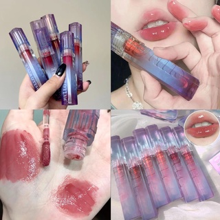 ภาพหน้าปกสินค้าHellostyle Dreamy Purple Glass Water Mirror ลิปกลอส ลิปกลอส ชุ่มชื้น Honey Lip Water Light Sense Glossy Lip Balm ซึ่งคุณอาจชอบราคาและรีวิวของสินค้านี้