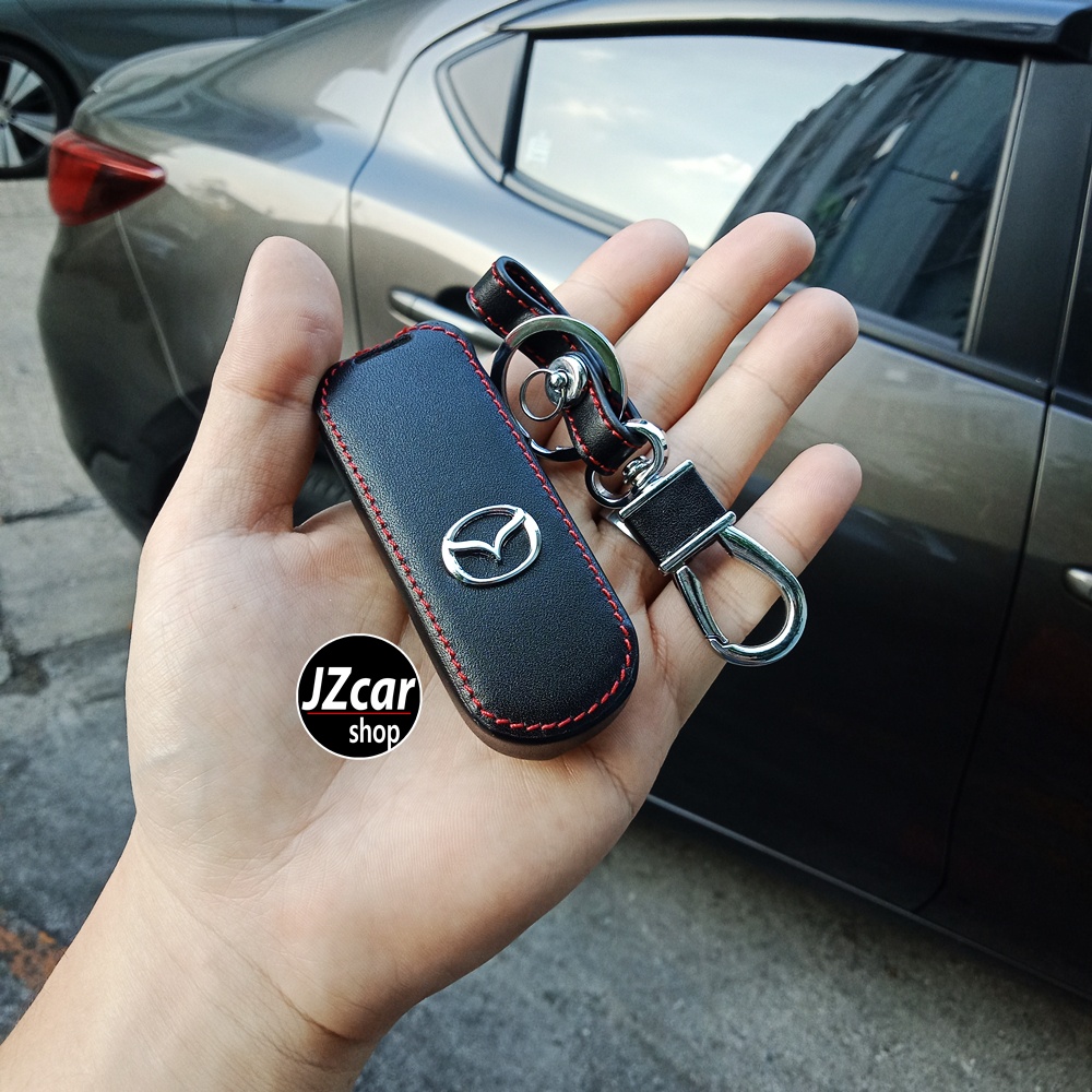 รูปภาพของเคสกุญแจรถยนต์ Mazda Skyactive 2 / 3 / CX-3 / CX-5 / Mazda 2 / Mazda 3 / 5ประตู / 4ประตู ซองกุญแจ หนัง 2018 2020 2021 20ลองเช็คราคา