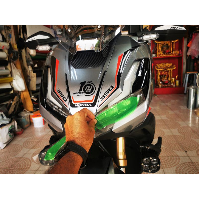 ฟิล์มแต่งไฟหน้า-honda-adv350