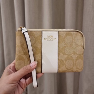 COACH F58035 CORNER ZIP WRISTLET IN SIGNATURE CANVAS