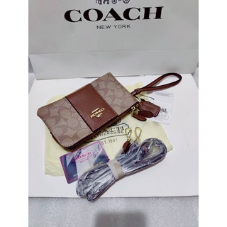 ภาพขนาดย่อของภาพหน้าปกสินค้ากระเป๋าคล้องมือ COACH 2ซิป กระเป๋าขนาด 7นิ้ว มาใหม่งานดี งานตรงปก รูปถ่ายจากสินค้าจริง พร้อมส่ง จากร้าน sengmara บน Shopee