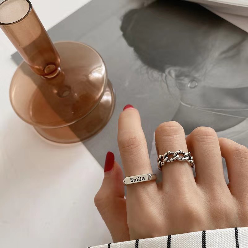 ภาพหน้าปกสินค้าเครื่องประดับแฟชั่นสตรีแหวนนิ้วมือโลหะผสมเงินฮอลโลว์พิมพ์ลายตัวอักษรสไตล์เกาหลี จากร้าน beautytoday.th บน Shopee