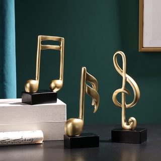 ชุดเครื่องประดับเรซิ่น รูปสัญลักษณ์ดนตรี สีทอง สไตล์นอร์ดิก สําหรับตกแต่งบ้าน ห้องนั่งเล่น ตู้ทีวี โต๊ะ