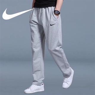 ภาพหน้าปกสินค้า【Hot Sale】M-5XL กางเกงกีฬา Nike กางเกงขายาวทรงแบนแห้งเร็วระบายอากาศได้ดี ที่เกี่ยวข้อง