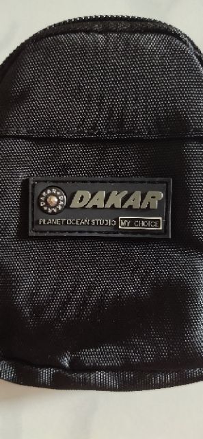 dakar-23-32-กระเป๋าใสกุญแจ