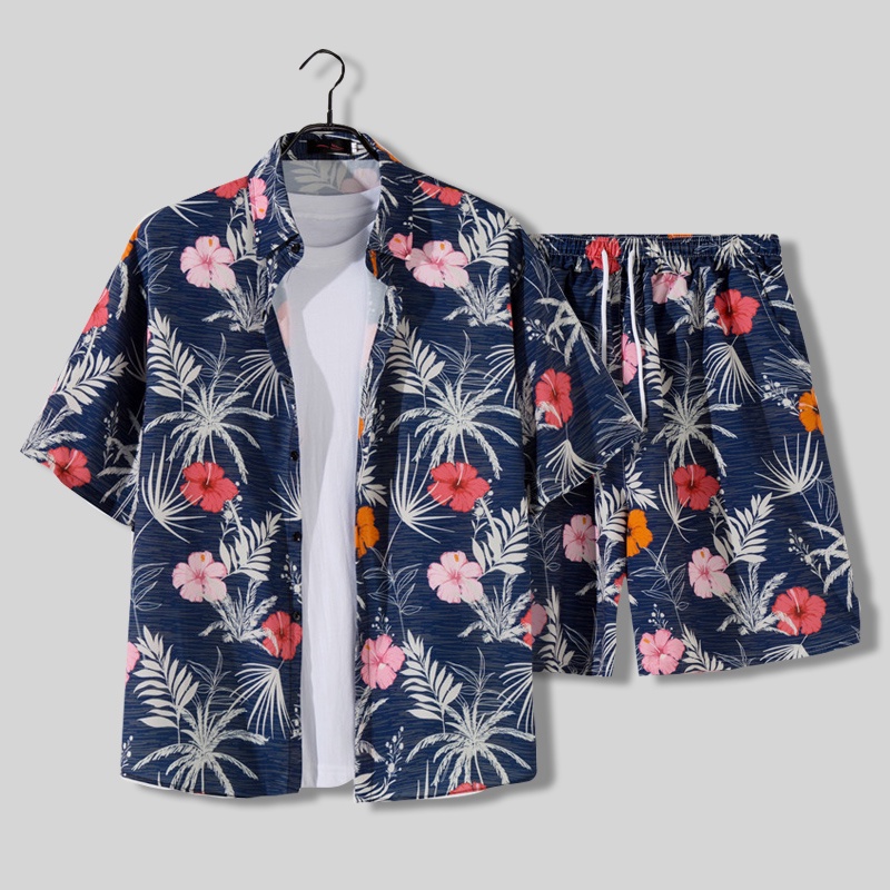 ภาพหน้าปกสินค้าเสื้อเชิ้ตแขนสั้น กางเกงฮาวาย ทรงหลวม ลายดอกไม้ เหมาะกับเดินชายหาด สไตล์ฮาวาย สําหรับผู้ชาย