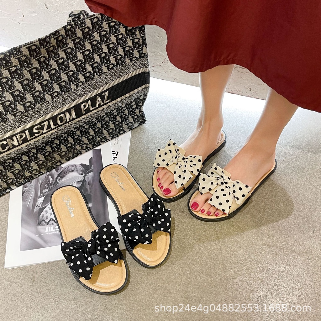 ภาพสินค้ารองเท้าแตะ สไตล์เกาหลี แต่งโบลายจุด น่ารัก รองเท้าแตะสำหรับผู้หญิง สวมใส่สบาย จากร้าน ccshop. บน Shopee ภาพที่ 1