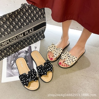 ภาพขนาดย่อของภาพหน้าปกสินค้ารองเท้าแตะ สไตล์เกาหลี แต่งโบลายจุด น่ารัก รองเท้าแตะสำหรับผู้หญิง สวมใส่สบาย จากร้าน ccshop. บน Shopee ภาพที่ 1