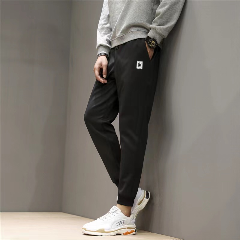 ภาพหน้าปกสินค้ากางเกงขายาวสไตล์ญี่ปุ่นสำหรับผู้ชายทรงหลวมและกางเกงลำลองทรงสปอร์ตขนาดใหญ่