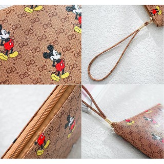 ภาพขนาดย่อของภาพหน้าปกสินค้า𝑬𝑽𝑬 กระเป๋าถือใบยาว ลายหลุยส์ mickey mouse (E-093) จากร้าน evefashionstore บน Shopee ภาพที่ 3