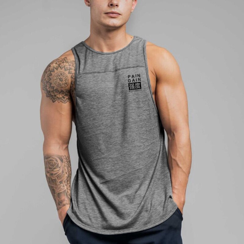 ภาพหน้าปกสินค้า2021 เสื้อกล้ามลำลองสำหรับผู้ชายแขนกุดเหมาะกับการเล่นฟิตเนส จากร้าน workoutvest.th บน Shopee