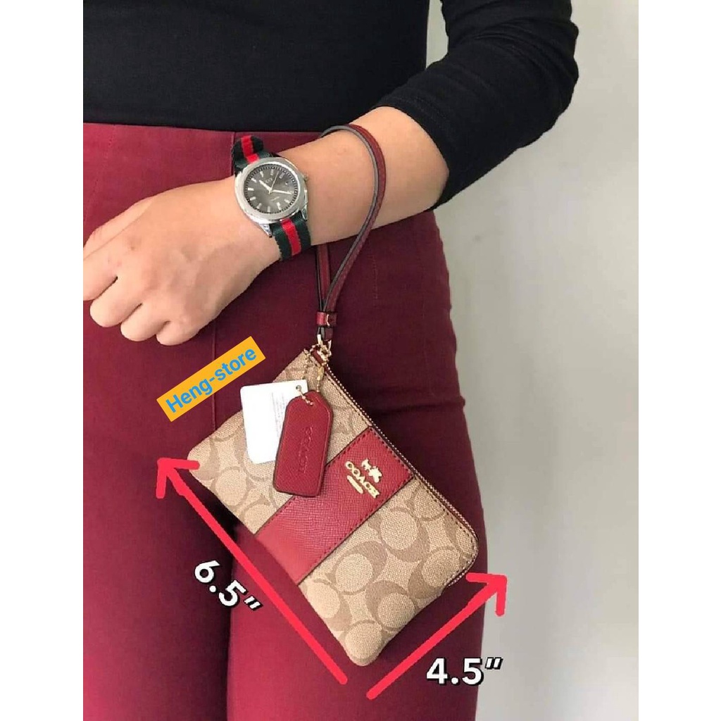 ภาพหน้าปกสินค้ากระเป๋าโคชขนาด 6.5'' มีสายคล้องมือ 1 ช่องซิปใส่มือถือใส่เงินได้ลายมาใหม่ จากร้าน ql71svlpx9 บน Shopee