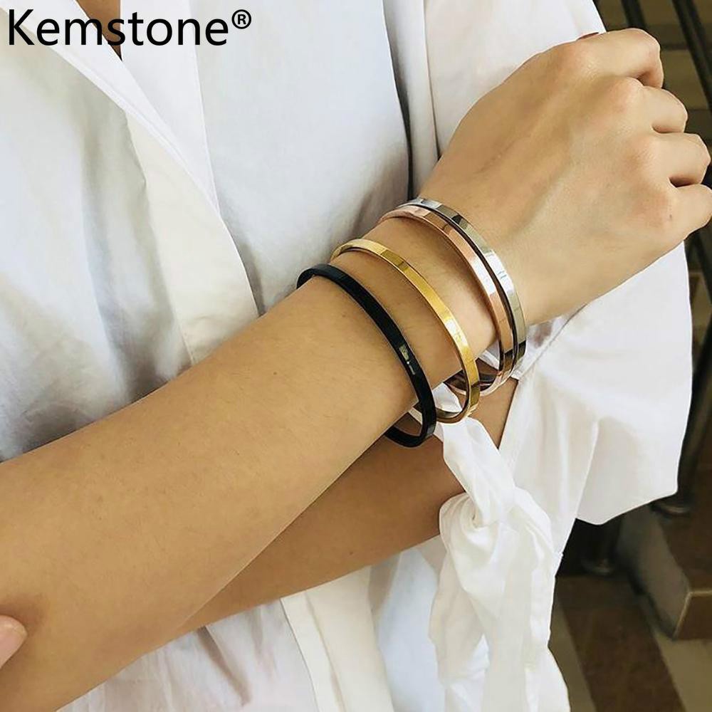 ราคาและรีวิวKemstone แฟชั่นไทเทเนียมเหล็กกำไลข้อมือเปิดเคลือบเงาปรับแต่งสร้อยข้อมือสำหรับผู้ชายผู้หญิง