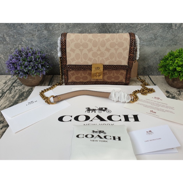 Hutton shoulder bag in blocked signature canvas with snakeskin detail sale