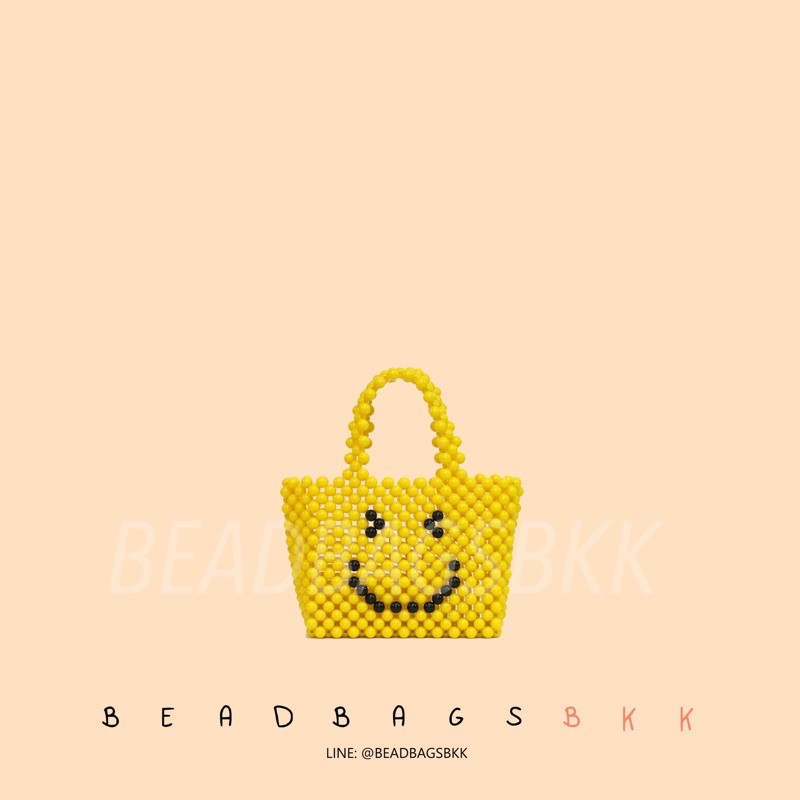 กระเป๋าลูกปัด-juno-bag-สีเหลืองลาย-smiley