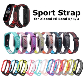 ภาพหน้าปกสินค้าXiaomi Mi Band 3 4 Strap Double Color Original Silicone Strap Replacement Wrist Strap Band Wriststrap Miband 3 4 Wristband Smartwatch ที่เกี่ยวข้อง