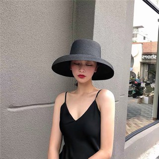 ภาพหน้าปกสินค้าหมวกสานปีกกลาง  พับได้ กันแดดกันยูวี หมวกผู้หญิง แฟชั่น ถ่ายรูปขึ้น รุ่นA033 สีกากี สีครีม สีดำ ที่เกี่ยวข้อง