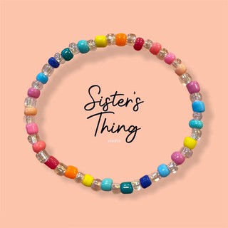 ภาพขนาดย่อของภาพหน้าปกสินค้าSisters Thing Studio  กำไลข้อมือลูกปัดเม็ดทราย สีรุ้ง สีพาสเทล (เอ็นยืด) จากร้าน sistersthingstudio บน Shopee