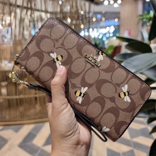 COACH C8675 LONG ZIP AROUND WALLET IN SIGNATURE CANVAS WITH BEE PRINT