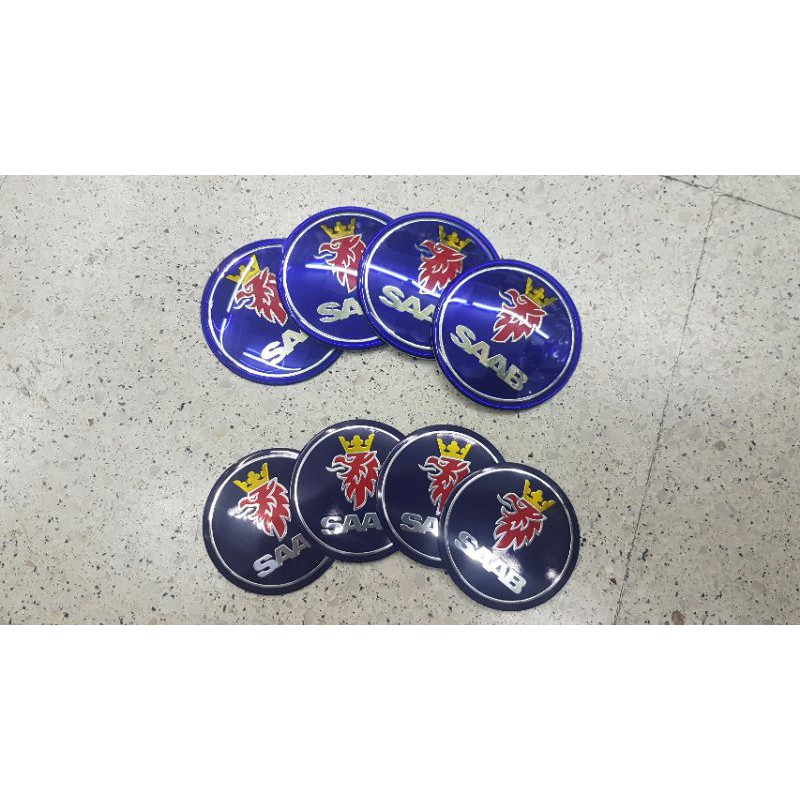 ราคาและรีวิววัด ครับ ราคาต่อ 4 ชิ้น SAAB WHEEL CAP LOGO โลโก้ติดดุมล้อ ชาร์ป สติกเกอร์นูน