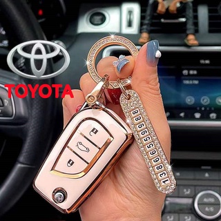 เคสหนัง TPU ประดับพลอยเทียม 3 ปุ่ม แบบพับได้ สําหรับ Toyota fortuner revo atis innova Levin Camry Reiz Highlander Corolla