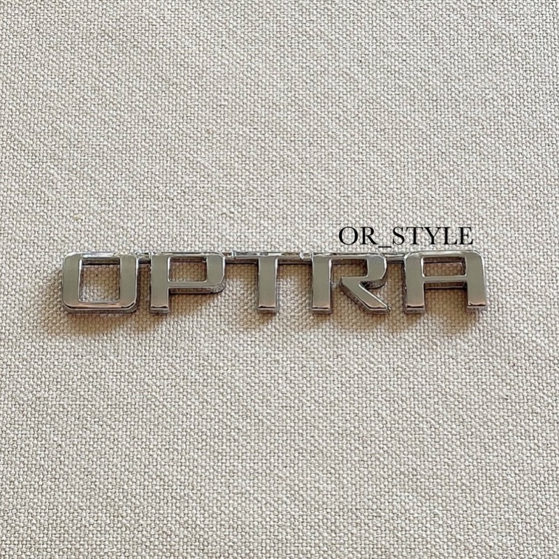 โลโก้ OPTRA ติดท้าย CHEVROLET สีเงิน ขนาด 13x2cm | Shopee Thailand