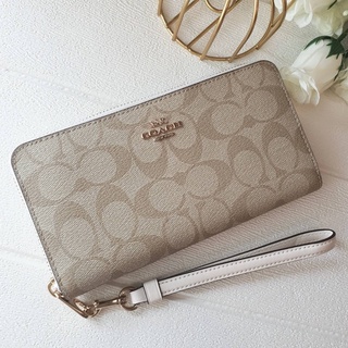 (ผ่อน0%) กระเป๋าตังค์ใบยาว มีสายคล้องมือ COACH C4452 LONG ZIP AROUND WALLET IN SIGNATURE CANVAS ลายซี สีครีม ซิปรอบ