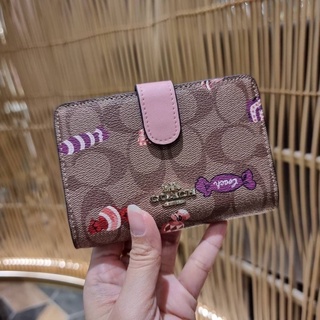 COACH MEDIUM CORNER ZIP WALLET IN SIGNATURE CANVAS WITH PRINTS