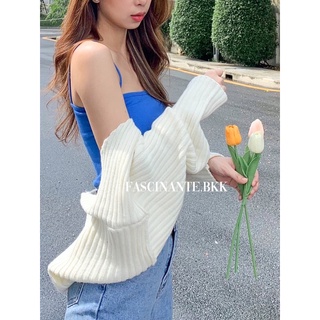 ภาพขนาดย่อของภาพหน้าปกสินค้าFascinante.bkk - knitted sleeve crop top จากร้าน fascinante.bkk บน Shopee