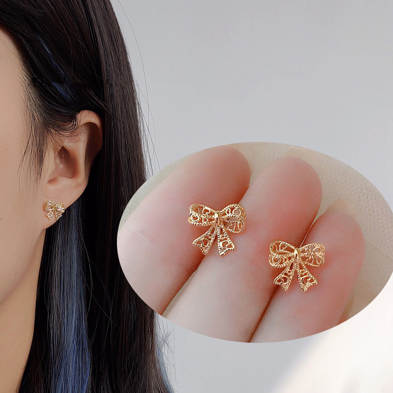ราคาและรีวิวต่างหู Elegant Bowknot Earrings Fashion Gold Heart Hollow Earring for Women Girl Lady Jewelry Accessories
