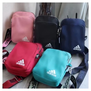 ภาพหน้าปกสินค้าพร้อมส่ง! Adidas กระเป๋าสะพายข้างสำหรับผู้ชายและผู้หญิง ซึ่งคุณอาจชอบสินค้านี้