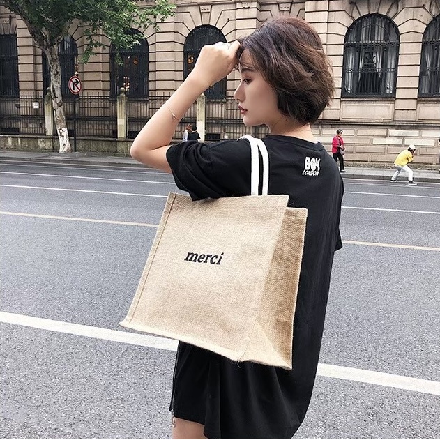 ภาพหน้าปกสินค้าOK0013 กระเป๋าถือ merci จากร้าน factory.bag บน Shopee