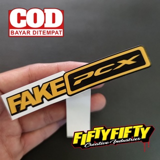 สติกเกอร์ พิมพ์ลาย FAKE PCX กันน้ํามันวาว สําหรับติดตกแต่งหมวกกันน็อค รถจักรยานยนต์ รถยนต์