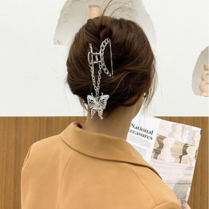 a-metal-hairpin-in-the-shape-of-a-butterfly-designed-for-women