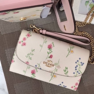 (ผ่อน0%) กระเป๋าสตางค์ coach GEMMA CLUTCH CROSSBODY WITH SPACED WILDFLOWER PRINT C3053 สีขาว ลายดอกไม้ สายโซ่ สะพายข้าง