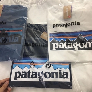 แฟชั่น Patagonia Stock เสื้อยืดคอก ลมแขนสั้นผ้าฝ้ายพิมพ์ลายตัวอักษร